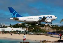 На райском острове самолёты садятся туристам на шею Пляжи где самолеты низко садятся